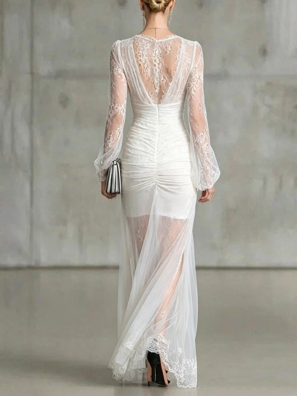Quintina | Long black dress with deep V-neck and dramatic slit